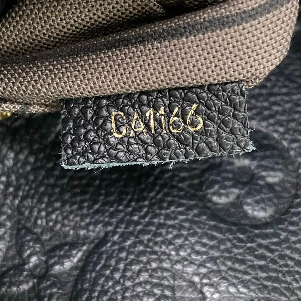 Louis Vuitton Artsy MM Monogram Empreinte Handbag M41066